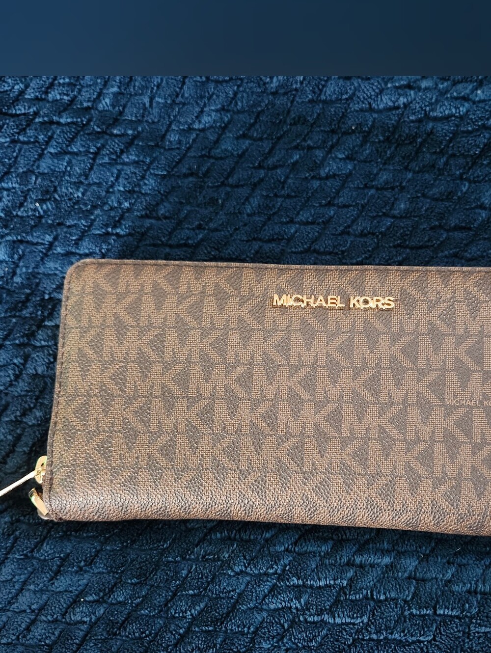 brown Michael Kors signature logo zip-around continental wallet